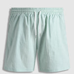 Men's solid color textured casual elastic waist shorts