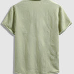 Men's textured seersucker half-button lapel solid color polo