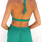 Solid color halter neck open back flared jumpsuit