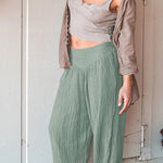 Loose wide leg trousers with leggings and sports trousers