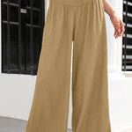 Cotton and linen distressed mid-rise wide-leg trousers