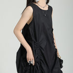 Loose Sleeveless Asymmetric Elasticity Pleated Solid Color Round-Neck Midi Dresses