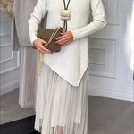 Jensine Ribbed Knit Long Sleeve Irregular Hem Loose Sweater