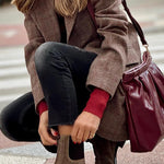 Mid-length buttoned small suit