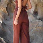 Fashion casual collarless straight wide leg open back cross strap jumpsuit