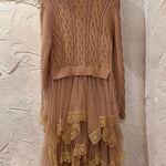 Irregular mesh skirt with fungus hem