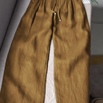 🔥Limited time promotion Women's Solid Color Pleated Drawstring Casual Cotton and Linen Wide Leg Pants