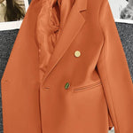 Metal-buttoned double-breasted suit jacket