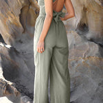 Fashion casual collarless straight wide leg open back cross strap jumpsuit