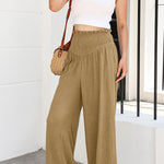 Cotton and linen distressed mid-rise wide-leg trousers