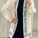 Off-white knitted cardigan with embroidery detail