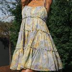 A-Line Loose Flower Print Layered Pleated Split-Joint Tied Spaghetti-Neck Mini Dresses