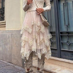 Irregular mesh skirt with fungus hem