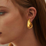 Women's chunky gold earrings