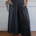 Jasper | High-waisted smocked trousers