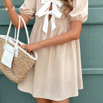 A-Line Loose Bowknot Elasticity Pleated Round-Neck Mini Dresses