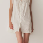Short Skirt with Pearl Buttons and Scalloped Trim and Round Neck.