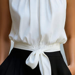 Sleeveless High-Neck Tie-Waist Blouse