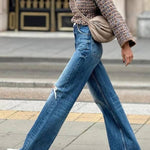 Brown and blue heathered chunky knitted turtleneck and flared sleeve sweater