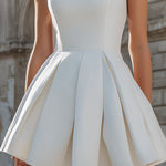 Sleeveless Structured Pleated Mini Dress