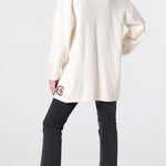 Off-white knitted cardigan with embroidery detail