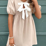 A-Line Loose Bowknot Elasticity Pleated Round-Neck Mini Dresses