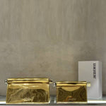 Mini clutch bag with metallic hardware
