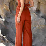 Fashion casual collarless straight wide leg open back cross strap jumpsuit