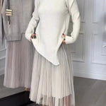 Jensine Ribbed Knit Long Sleeve Irregular Hem Loose Sweater