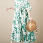 Loose Short Sleeves Floral Printed Pleated Split-Joint Round-Neck Midi Dresses