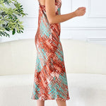 Goya snakeskin strap deep v-neck dress