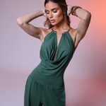 Gioia dress. Timeless elegance encapsulated in a fluid and sensual silhouette. This draped jumpsuit is designed for the woman who knows how to effortlessly command attention.