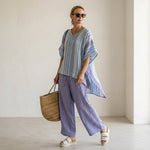 Carlotta – Elegant outfit: lavender and sky blue top with linen trousers