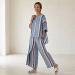 Ginevra – elegant pastel mauve top and striped linen trousers