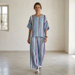 Ginevra – elegant pastel mauve top and striped linen trousers