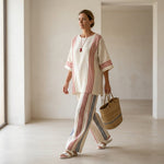 Ludovica – sophisticated multicolored striped top paired with Mediterranean trousers