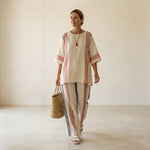 Ludovica – sophisticated multicolored striped top paired with Mediterranean trousers
