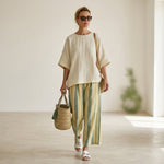Caterina – an elegant top and striped linen trousers for a chic and sophisticated look