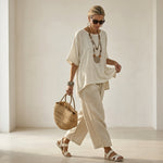 Beatrice – A comfortable and essential shirt, paired with wide-leg trousers