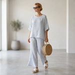 Federica – Sophisticated blue striped linen top, paired with loose-fitting trousers