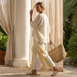 Arianna – Elegant linen set: yellow striped top and long-legged trousers