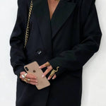 Wide-shouldered tailored suit jacket