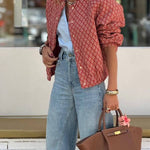 Red and brown paisley print cropped jacket with gold buttons
