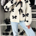 Vernie Knit Jewelry Pendant Bow Pattern Front Tie-up Long Sleeve Loose Cardigan