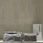 Mini clutch bag with metallic hardware