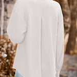 Loose Pocket Lapel Button Textured Blouse