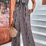 Wrap python-print suspenders wide-leg jumpsuit
