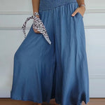 Jasper | High-waisted smocked trousers