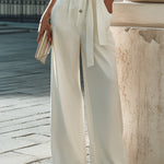 White Belted Jumpsuit With Sleeveless Design