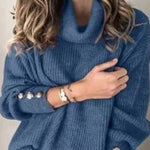 High-neck button-decorated loose knit sweater